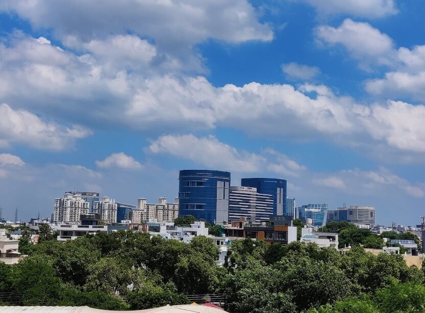 Sikanderpur_a cityscape of a city with tall buildings