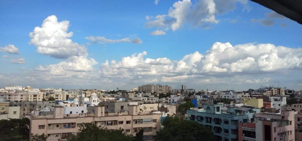 Ameerpet_a city skyline with buildings and a sky background
