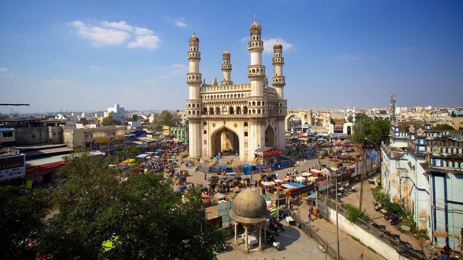 Charminar_a large building with a clock on top of it