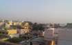 Ibrahimpatnam_a city with lots of buildings and a sky background