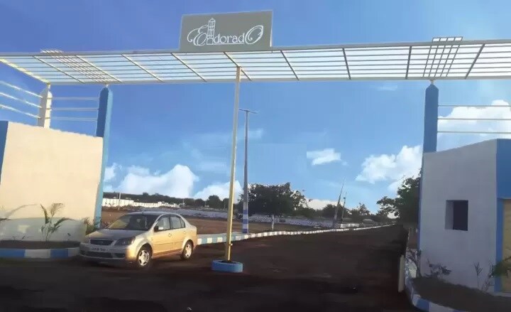 Kandukur_a car that is parked in front of a building