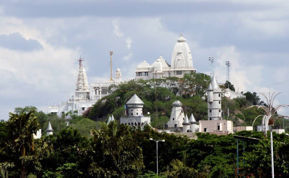 Khairatabad_a large building with a clock on top of it