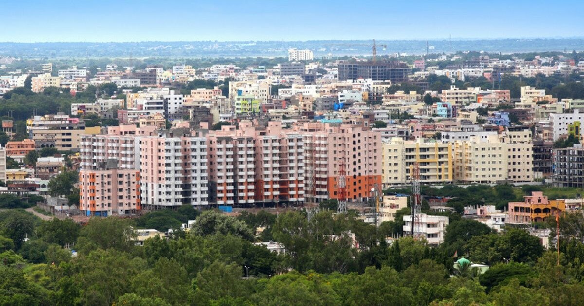Mallapur_a city with lots of tall buildings and trees