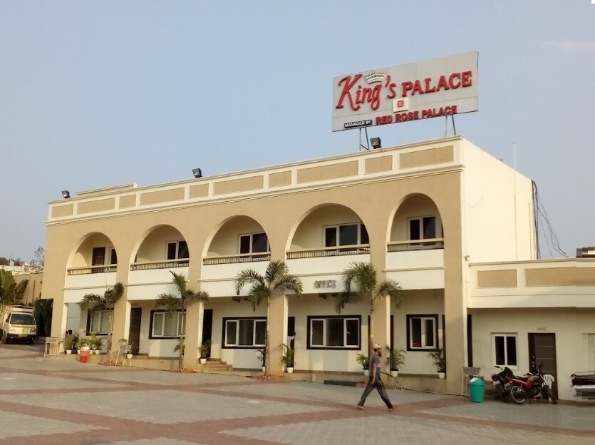 Mehdipatnam_a large building with a sign on the side of it