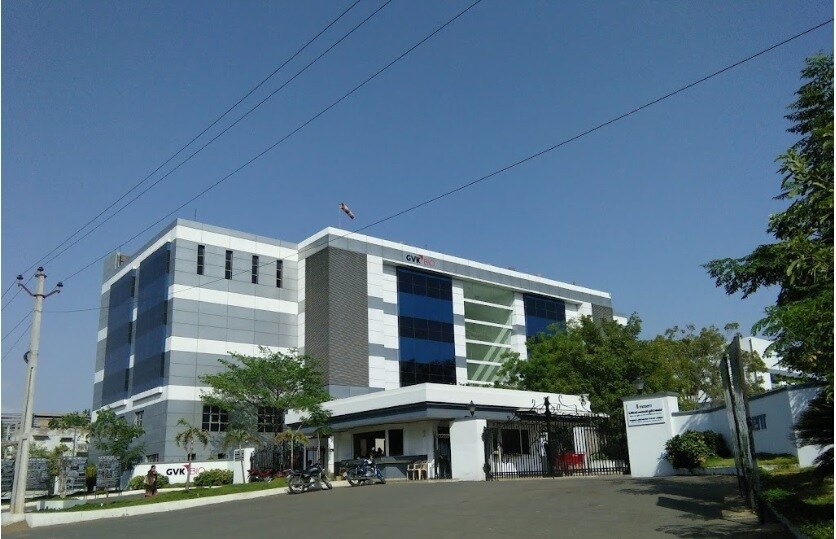 Nacharam_a large building with a large clock on the side of it