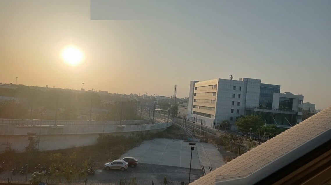 Nagole_a large building with a view of the ocean