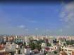 Pragathi Nagar_a city with lots of buildings and a sky background