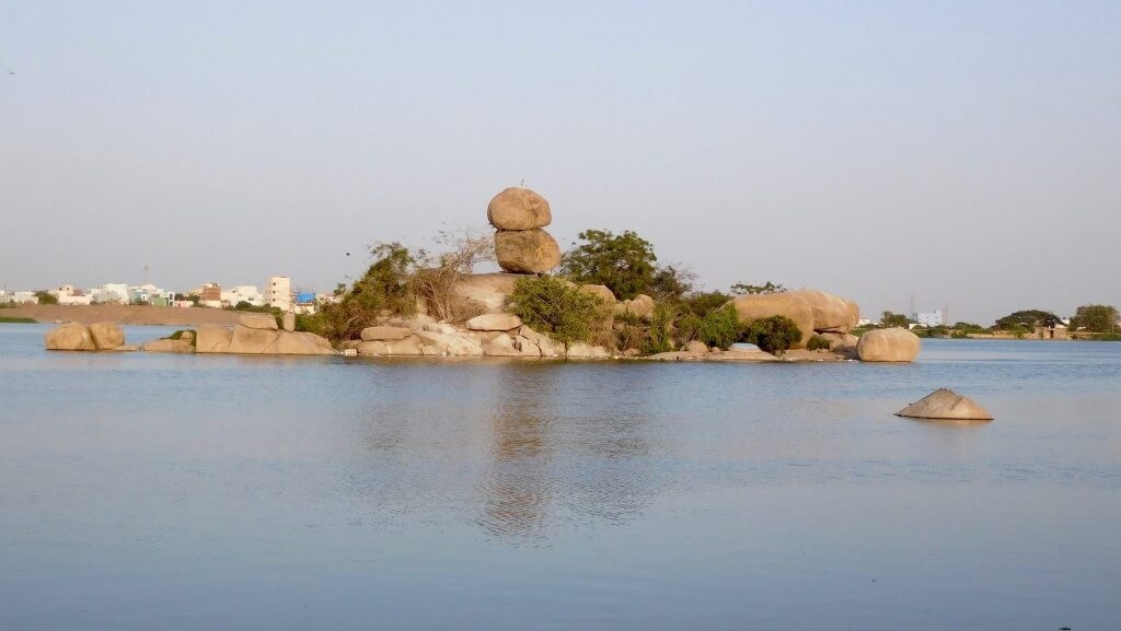 Shamirpet_a large body of water with a lighthouse