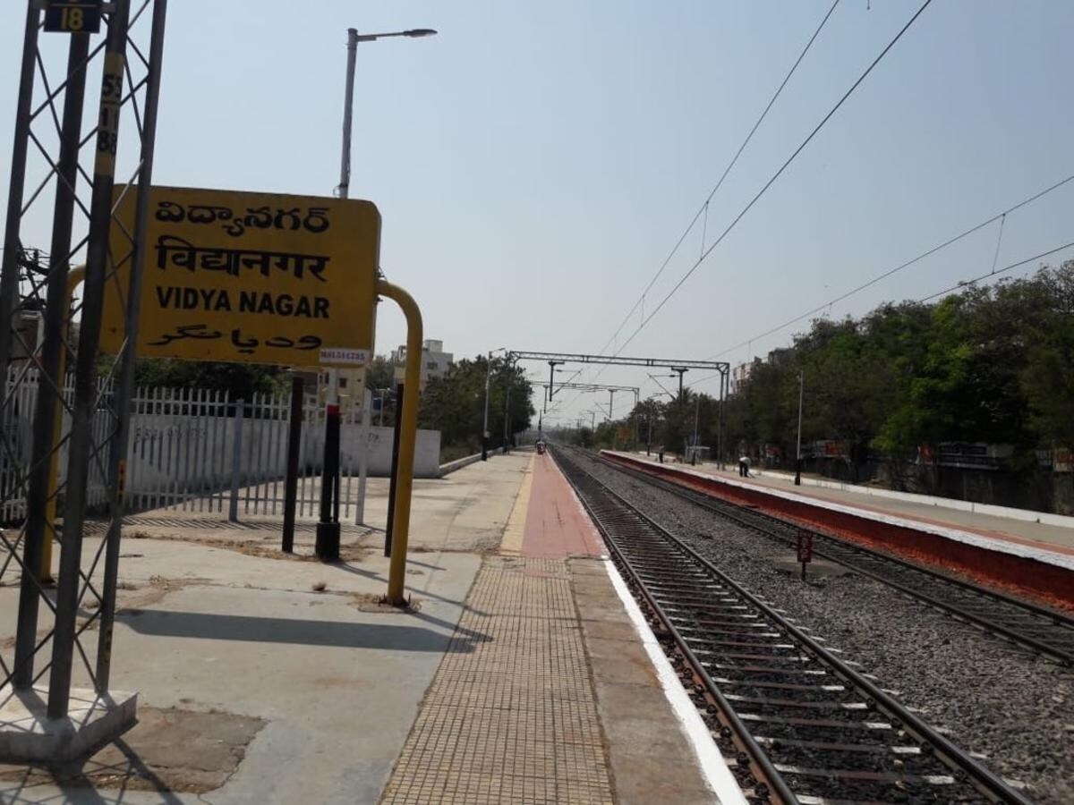 Vidyanagar_a train station with a train on the tracks