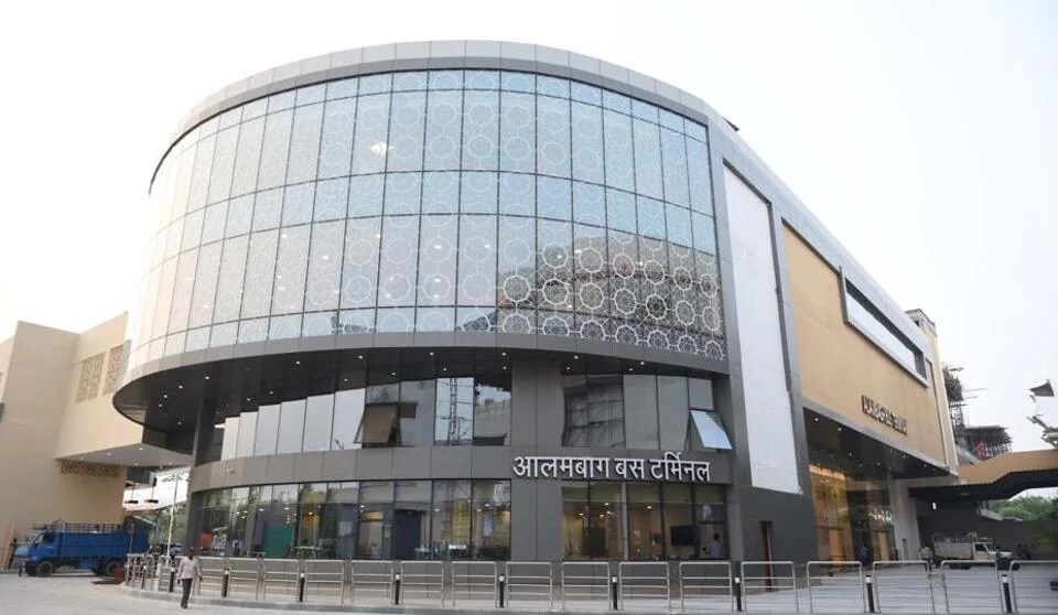 Alambagh_a large building with a clock on the front of it