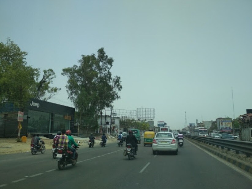 Chinhat_motorcycles are driving down the road