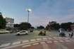 Daliganj_a street scene with cars and people on the road