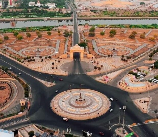 Gomti Nagar_a large building with a clock on top of it