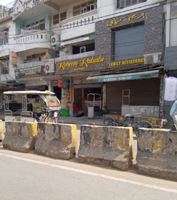 Mati_a building with a sign on the side of it