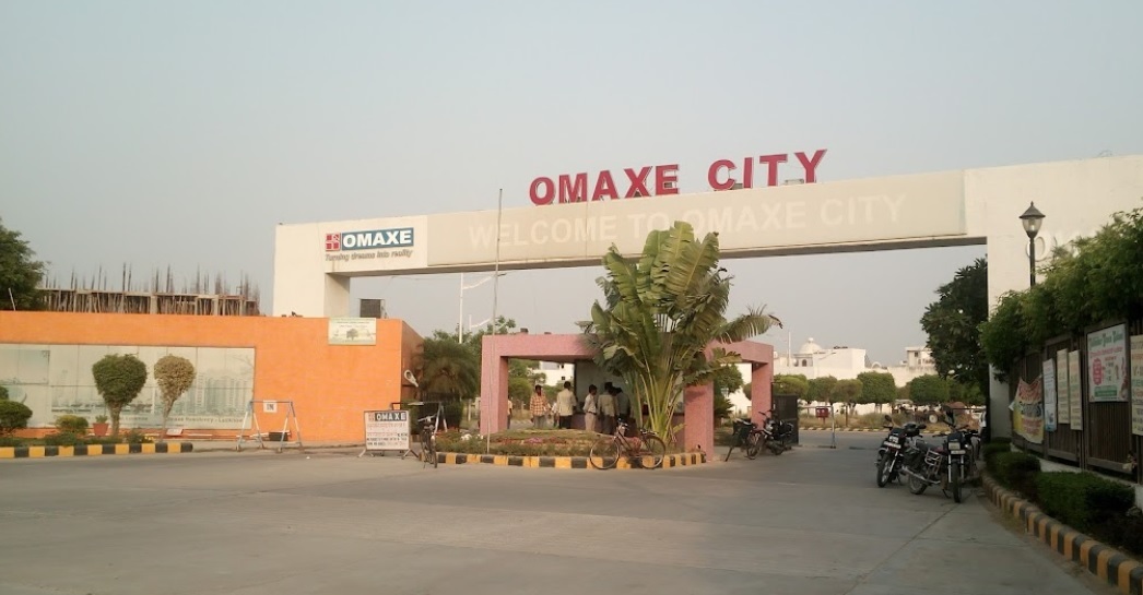 Omaxe City_a large building with a sign on the side of it