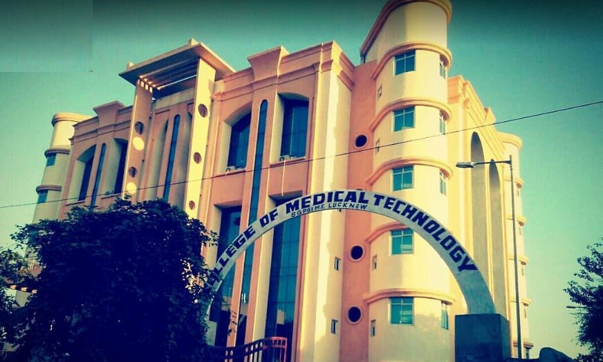 SGPGI_a large building with a clock on top of it