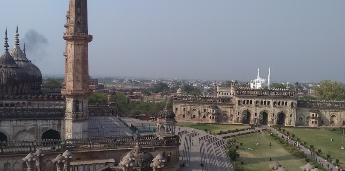 Thakurganj_a large building with a clock on top of it