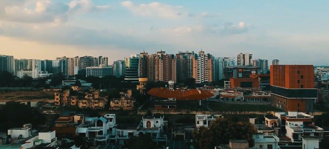 Vibhuti Khand_a city with lots of tall buildings