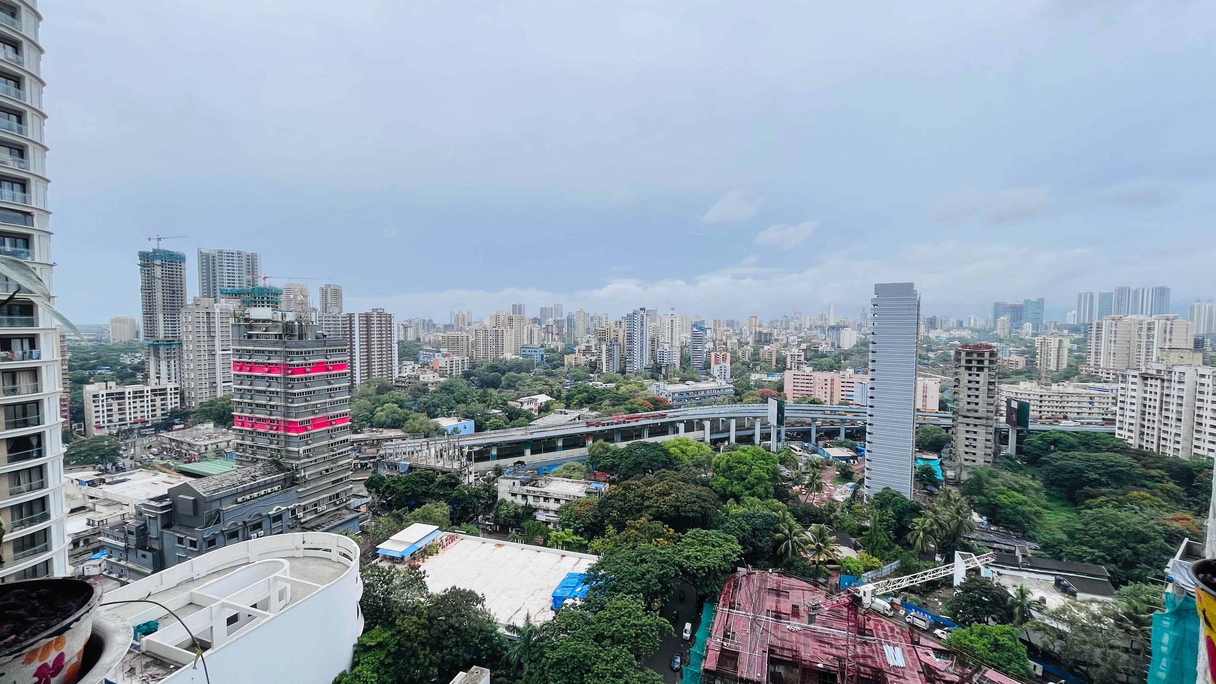 Adarsh Nagar_a cityscape of a city with tall buildings