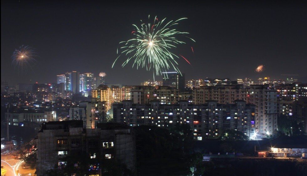Andheri East_a city at night with skyscrapers in the distance