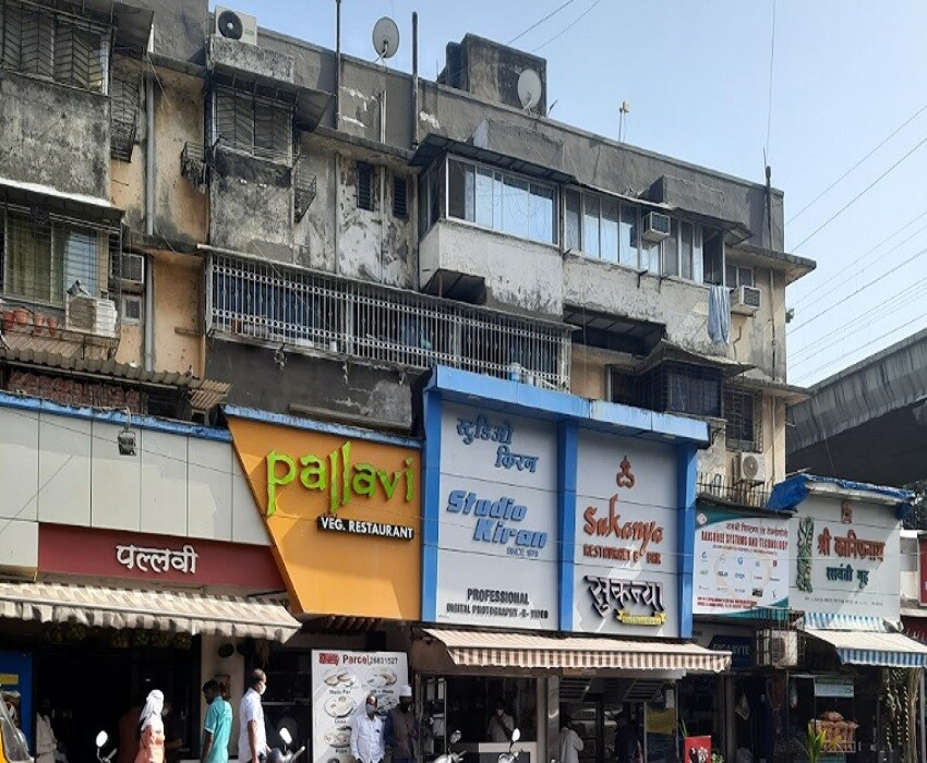 Azad Nagar_a large building with a lot of windows on it