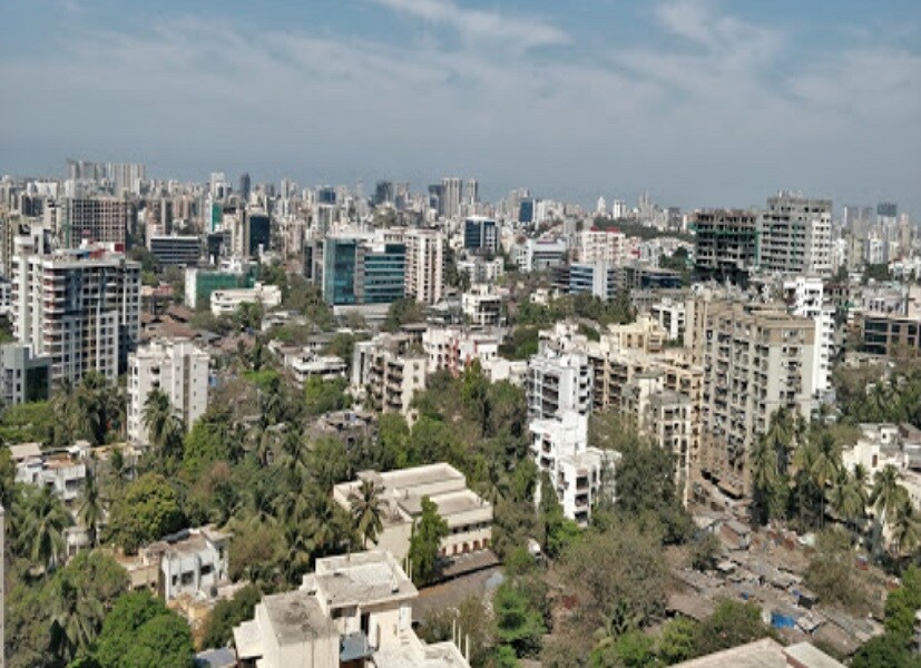 Azad Nagar_a city with lots of tall buildings and trees