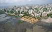 Bandra West_a large body of water surrounded by tall buildings