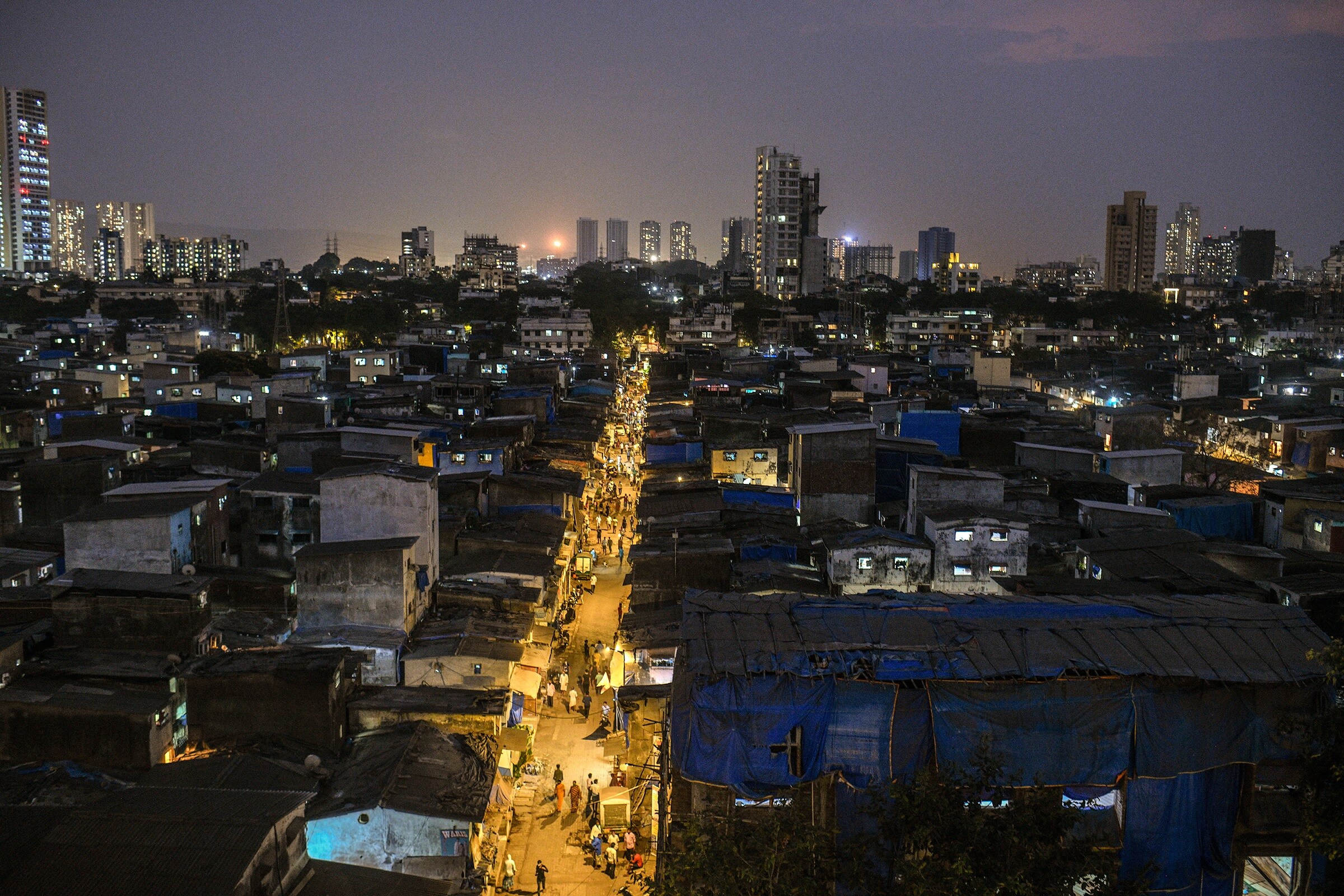 Dharavi_a city street filled with lots of tall buildings