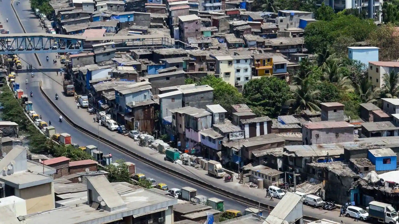 Dharavi_a train going down a track in a rural area