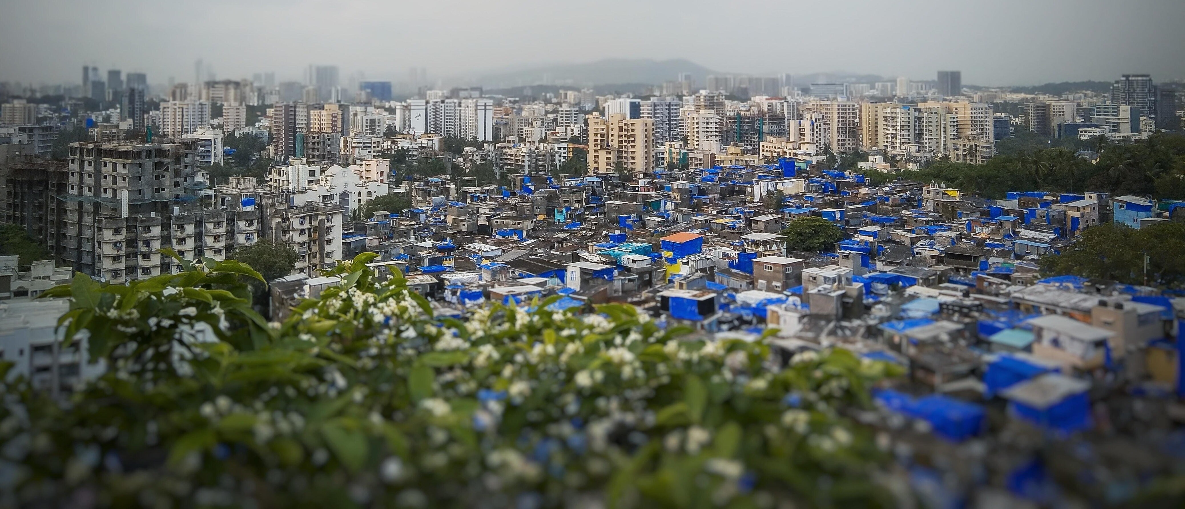 Gandhi Nagar_a city filled with lots of umbrellas on a cloudy day