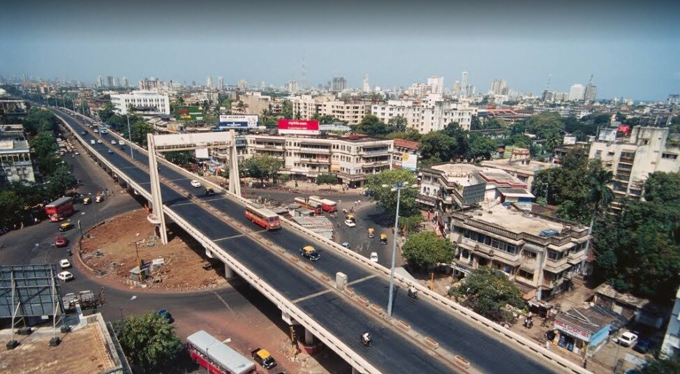 GTB Nagar_a city street filled with lots of tall buildings