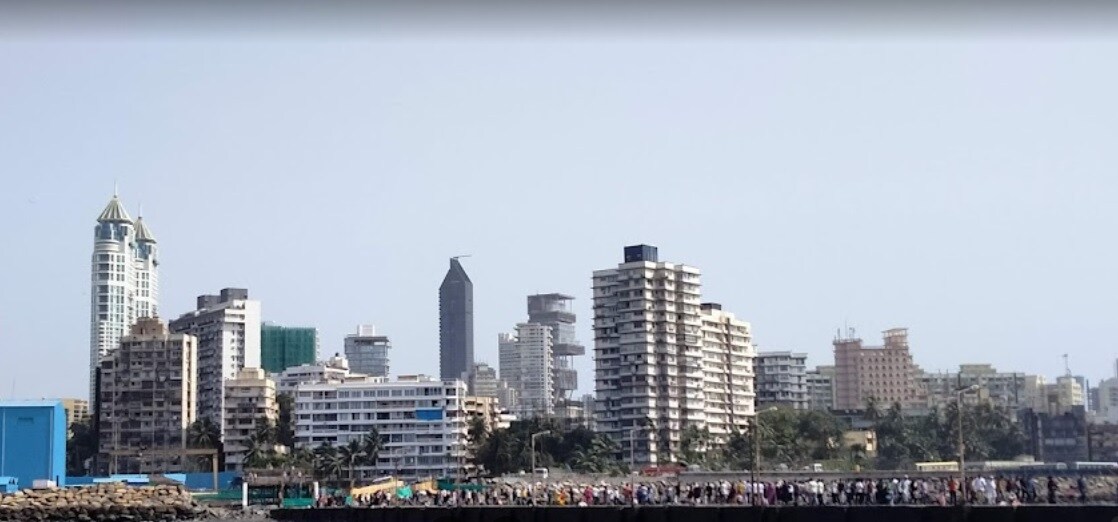 Haji Ali_a city with tall buildings and tall buildings