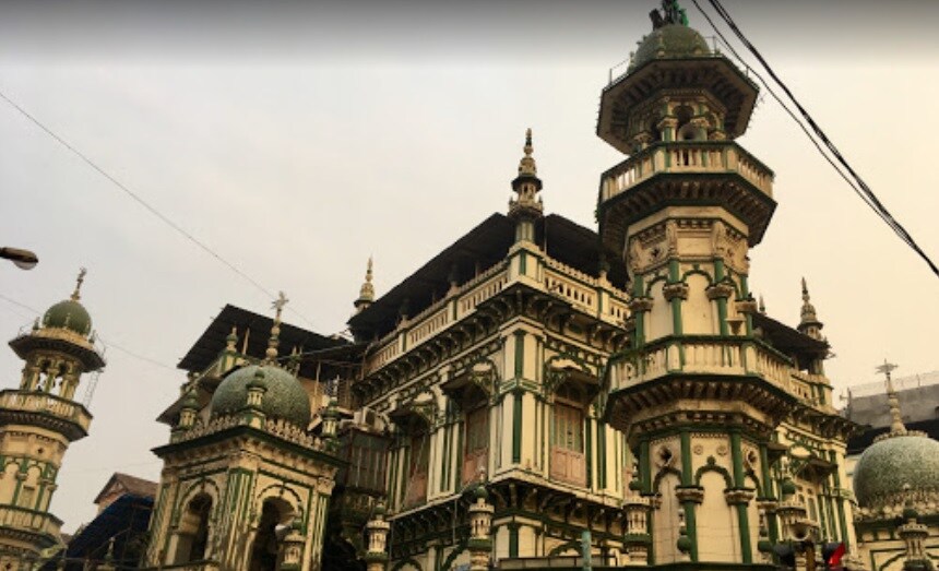 Mandvi_a large building with a clock on the top of it