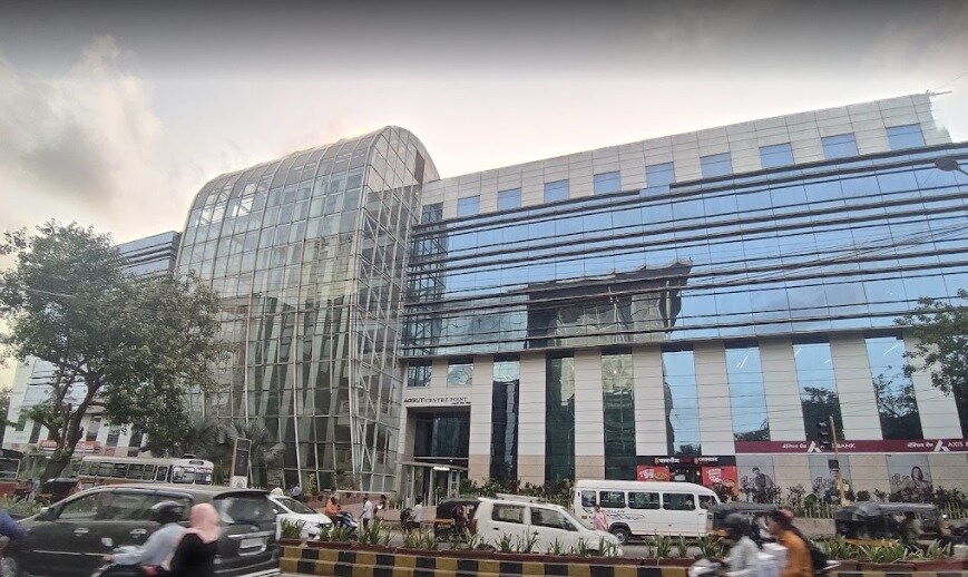 MIDC_a city street filled with lots of tall buildings