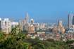 Mulund West_a city with many tall buildings and a sky background
