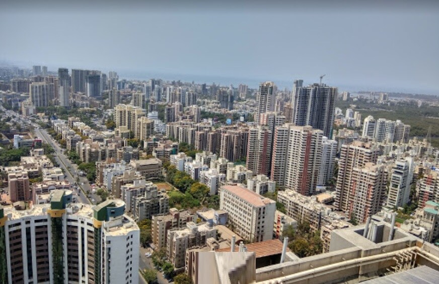 Patliputra_a city with tall buildings and a sky background