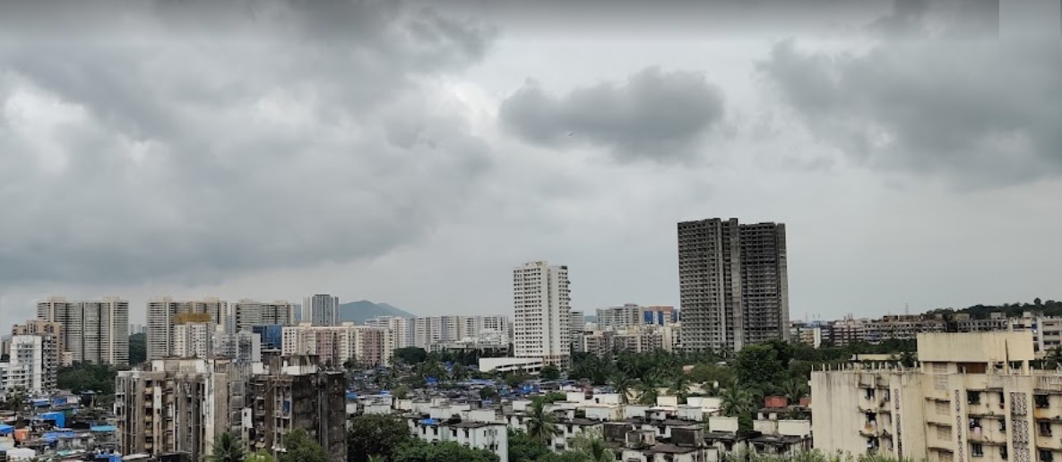 Pratap Nagar_a city skyline with buildings and a sky background