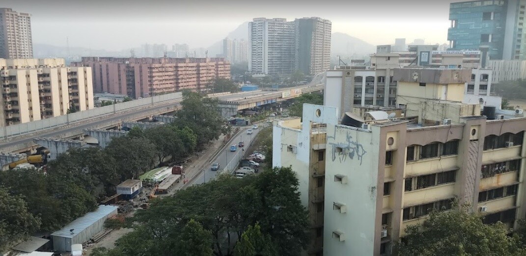 Shivaji Nagar_a city street with tall buildings and buildings