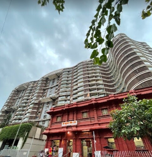 Subhash Nagar_a tall building with a clock on the front of it