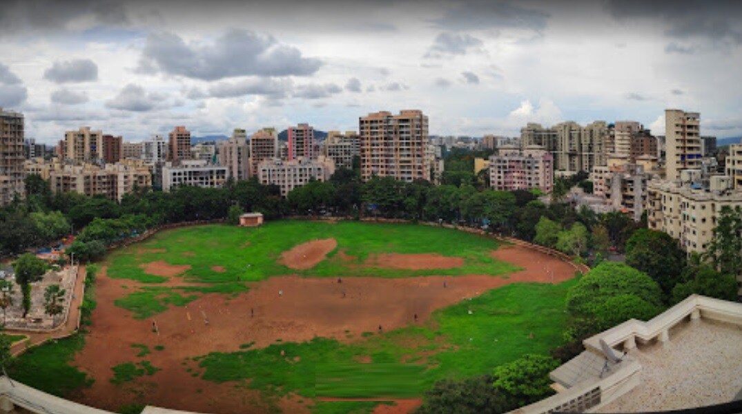 Tilak Nagar_a large field with a bunch of green grass
