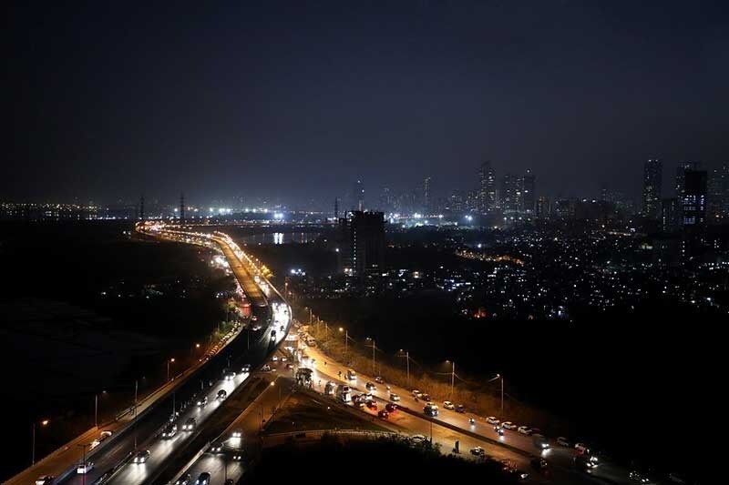 Wadala_a city at night with a large city at the top