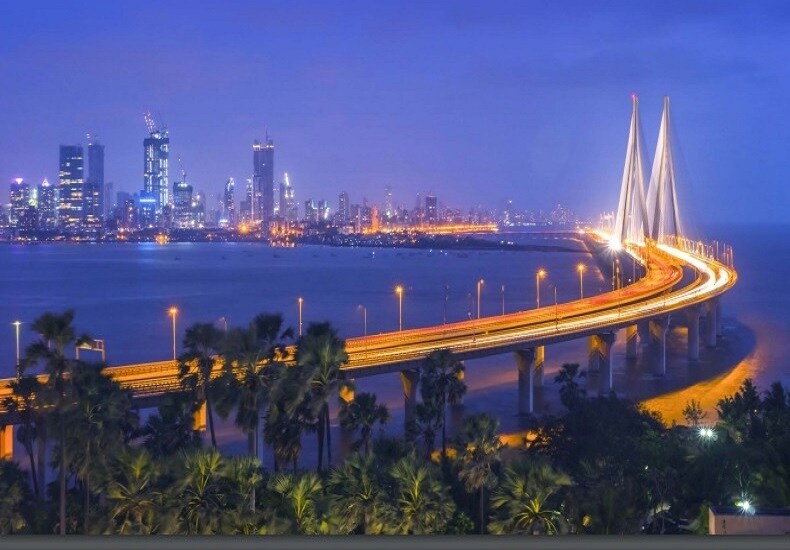 Worli_a city at night with a large body of water