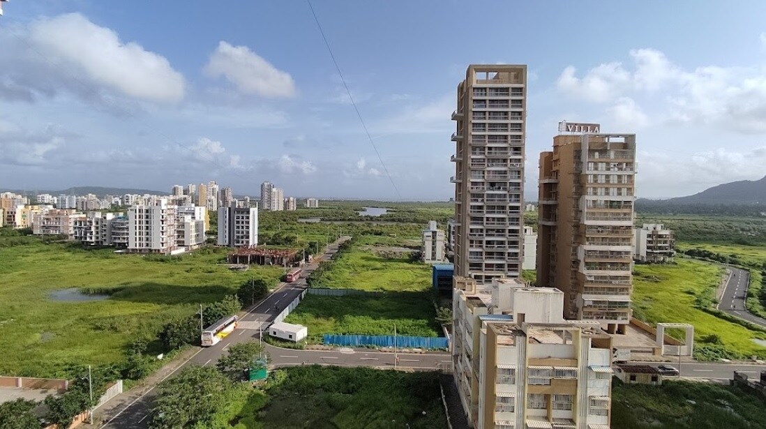 Dronagiri_a cityscape of a city with buildings and buildings