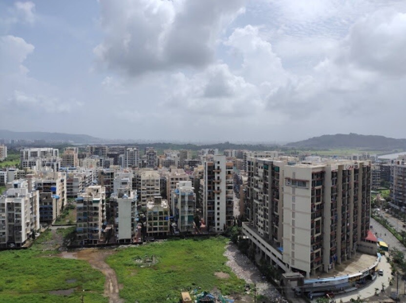Ulwe_a large building with a lot of windows on top of it