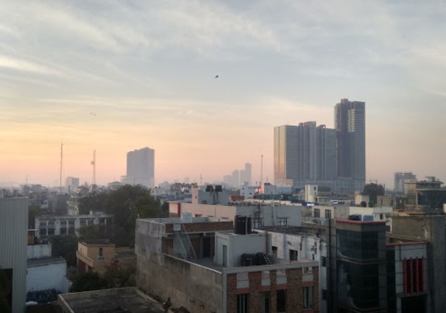 Sector 2_a city skyline with buildings and a sky background