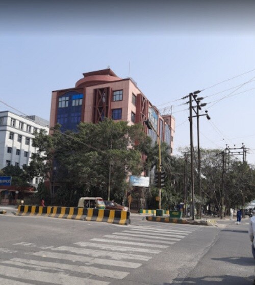 Sector 22_a city street filled with lots of tall buildings