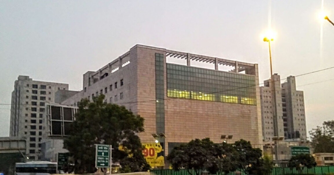 Sector 26_a large building with a large clock on it