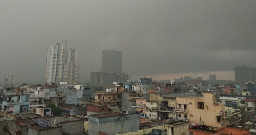 Sector 31_a city with buildings and a sky background