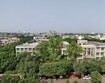 Sector 56_a large building with trees and houses