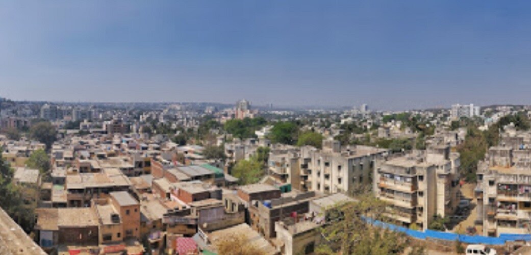 Indira Nagar_a city with lots of tall buildings and trees